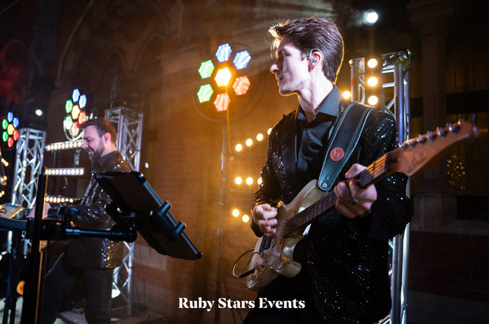 Callum Garland performing at a wedding