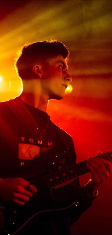 Callum Garland performing live on stage